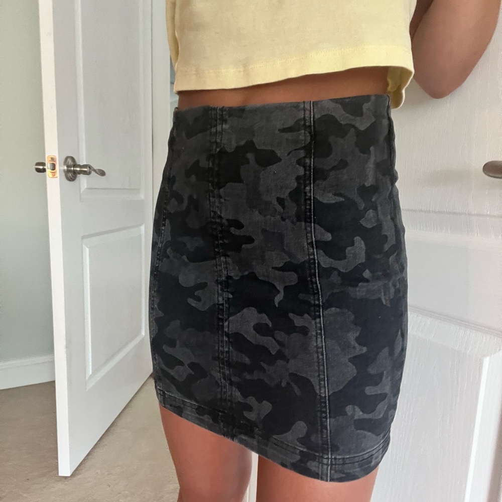 Dark grey and black camp pencil skirt from free people. It’s very comfortable